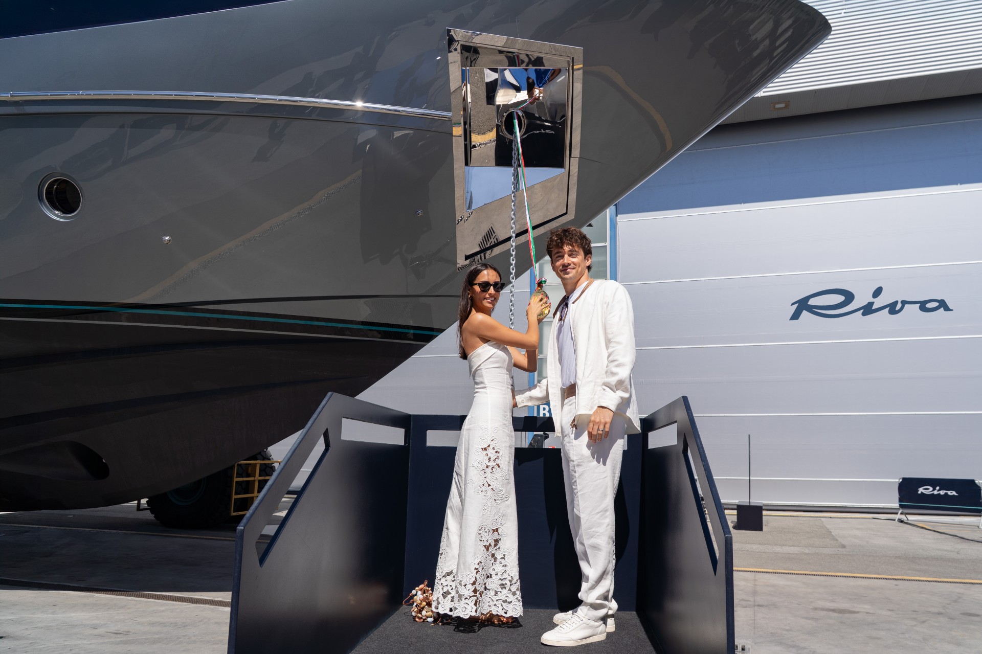 Charles Leclerc and Alexandra Leclerc at the Riva La Spezia shipyard during the launch ceremony of the 20th Riva 102' Corsaro Super.
