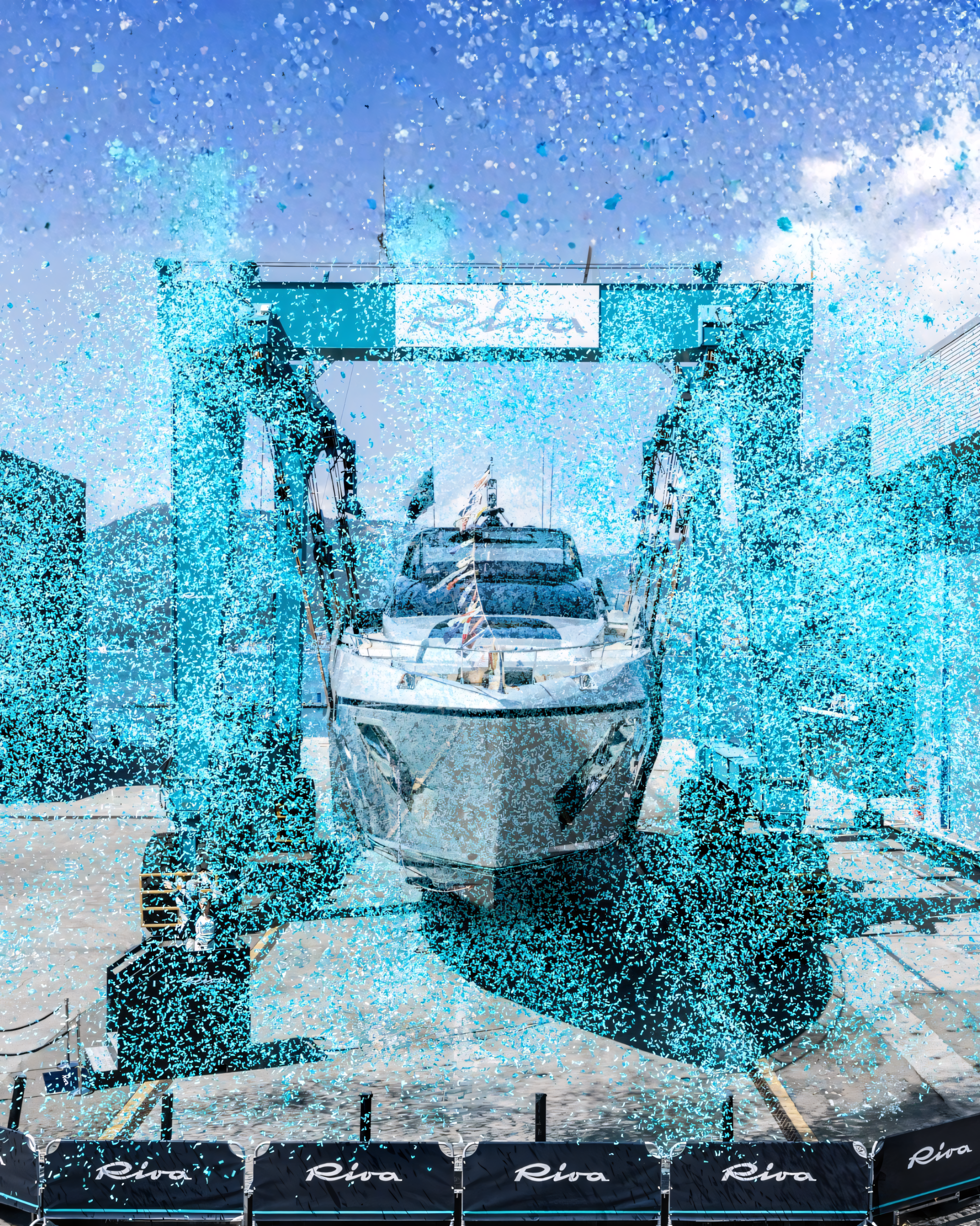 Riva 96 Argo Super being launched in the travel lift at La Spezia